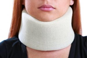 Woman in neck brace