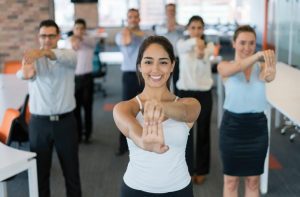 Employees stretching in the workplace