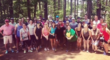 group of colleagues together, taking part in a charity run