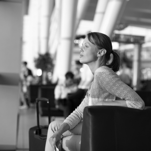 Female traveler in black and white