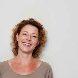 Women smiling, showing good mental health