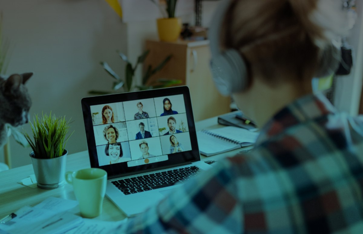 A woman working from home having a video call meeting.