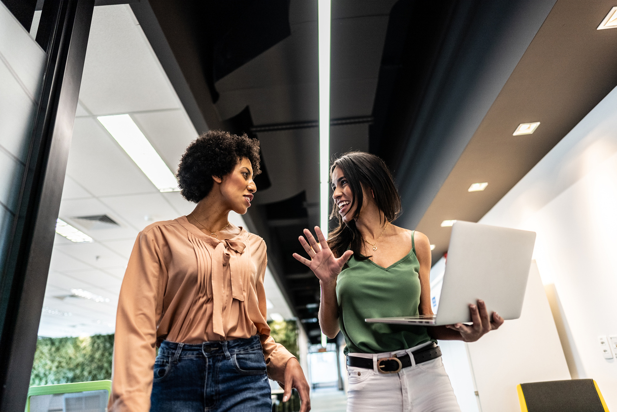 Coworkers talking on the office