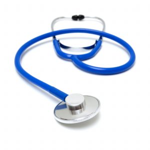 A blue doctors stethoscope lying flat against a white background.