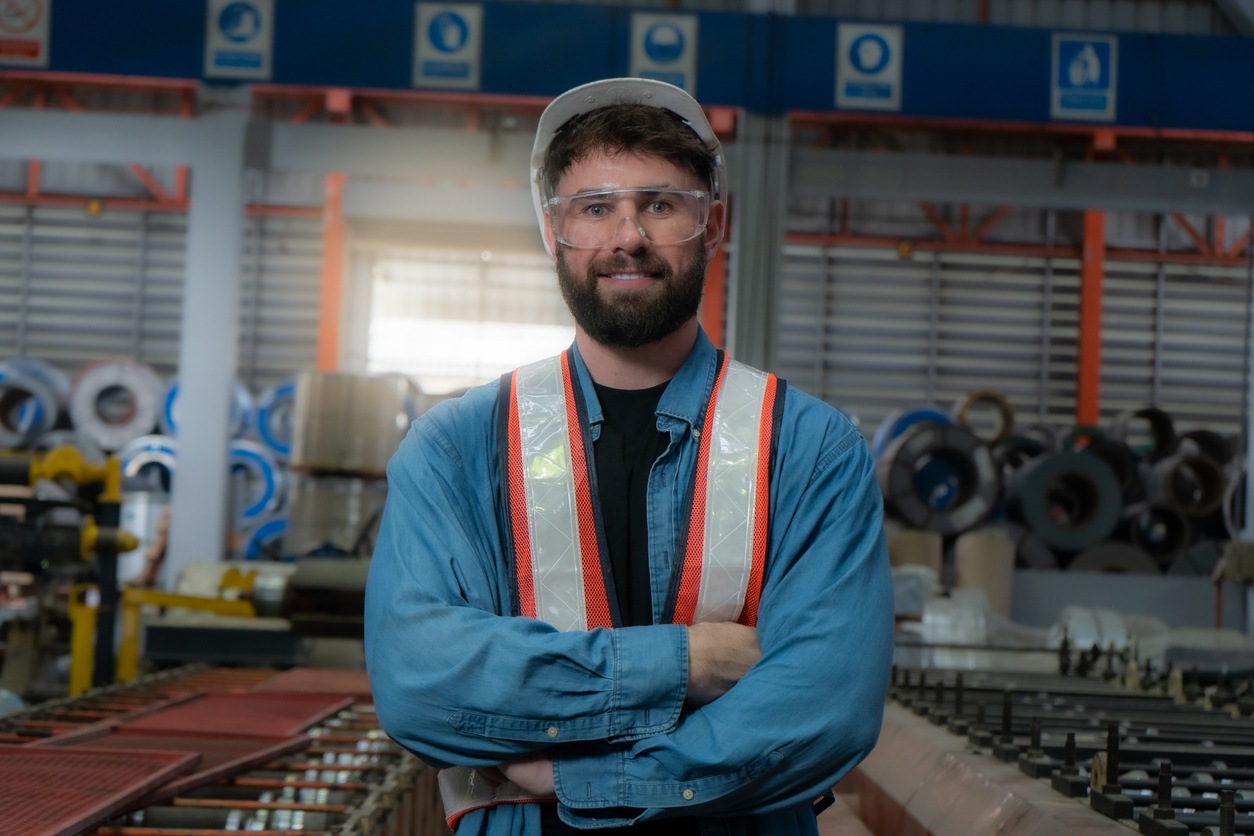 Close up view of engineer in factory or skilled factory worker industrial and engineering concepts