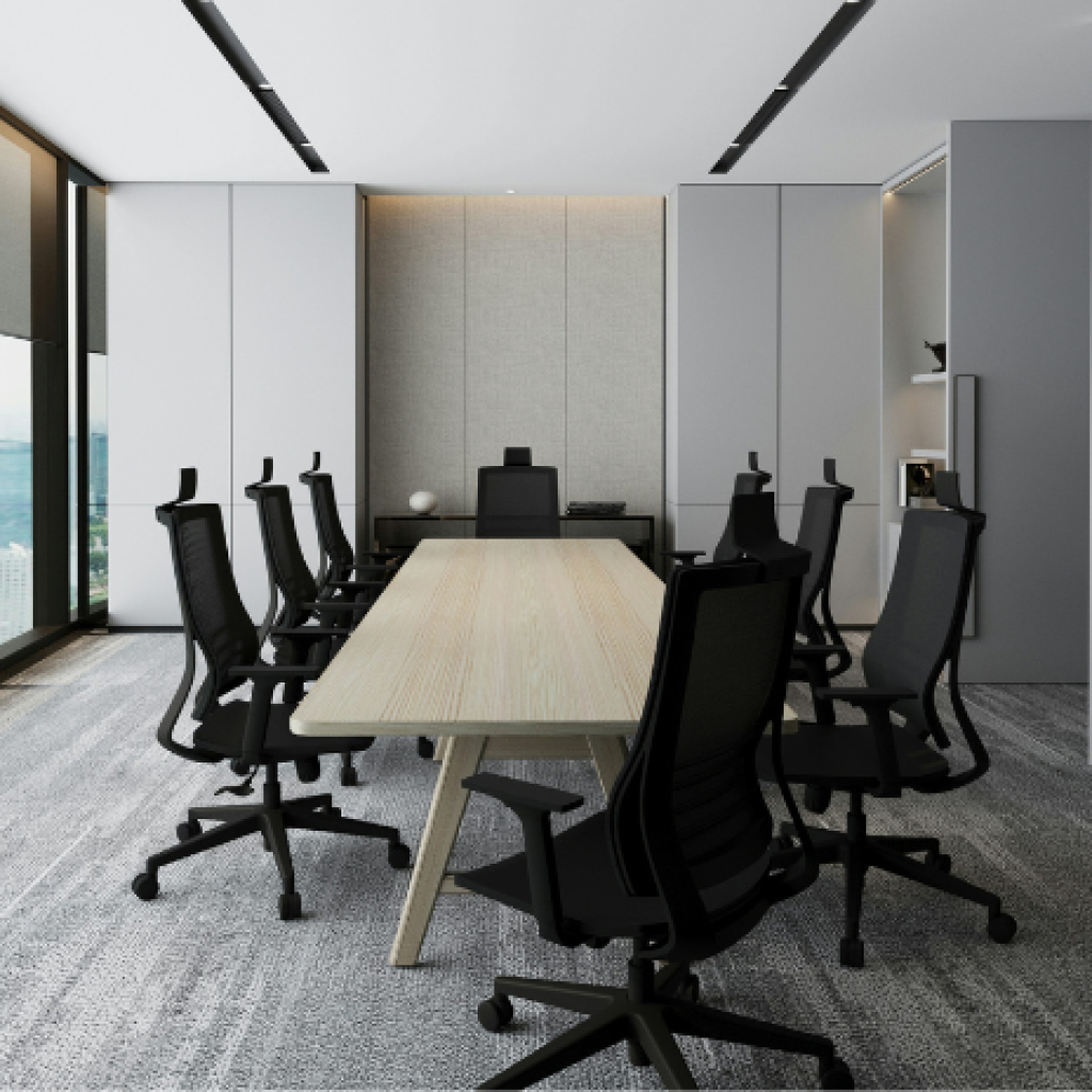An office conference room with ergonomic chairs set around the table.