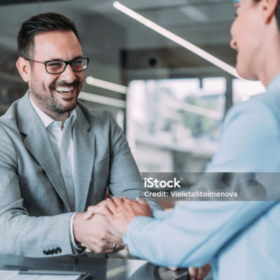 the-right-surveyor-for-you-2 An insurance risk surveyor shaking hands with a client